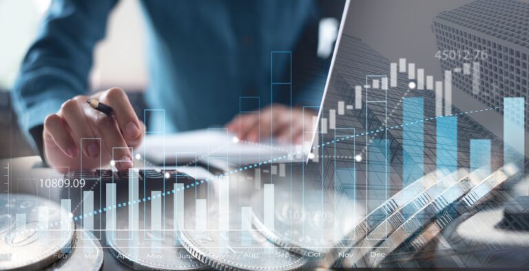 Close-up of a businessperson analyzing financial data with a calculator and laptop, overlaid with upward-trending financial graphs and charts. Symbolizes the importance of clean, accurate financial records in maximizing business sale value, a key focus in M&A strategy.