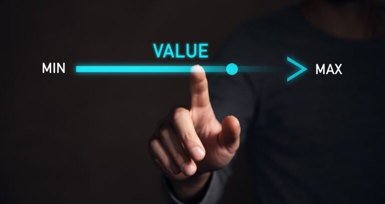 A hand slides a digital dial toward the word "MAX" on a glowing horizontal scale labeled "VALUE," symbolizing the process of increasing a business’s market value through strategic preparation and smart positioning before a sale.