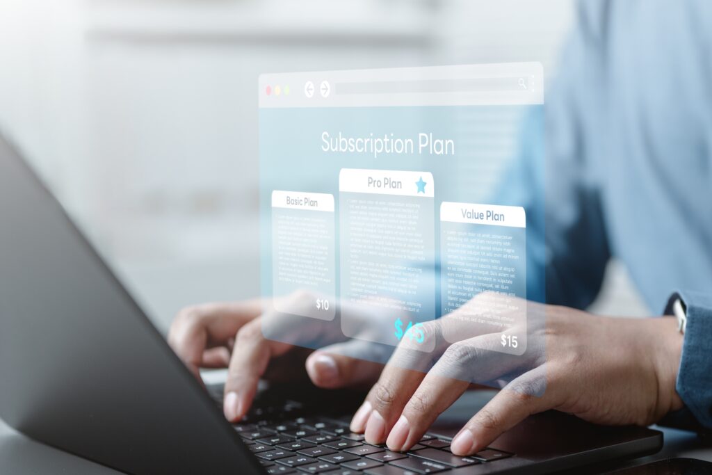 Business owner managing subscription plans and recurring revenue model to increase business valuation and attract buyers during a business sale.