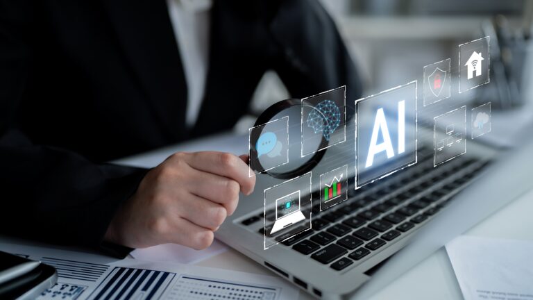 Business professional using artificial intelligence tools on a laptop to analyze data for mergers and acquisitions, business valuation, and due diligence